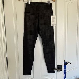 Brand new, tags on lululemon size 10.